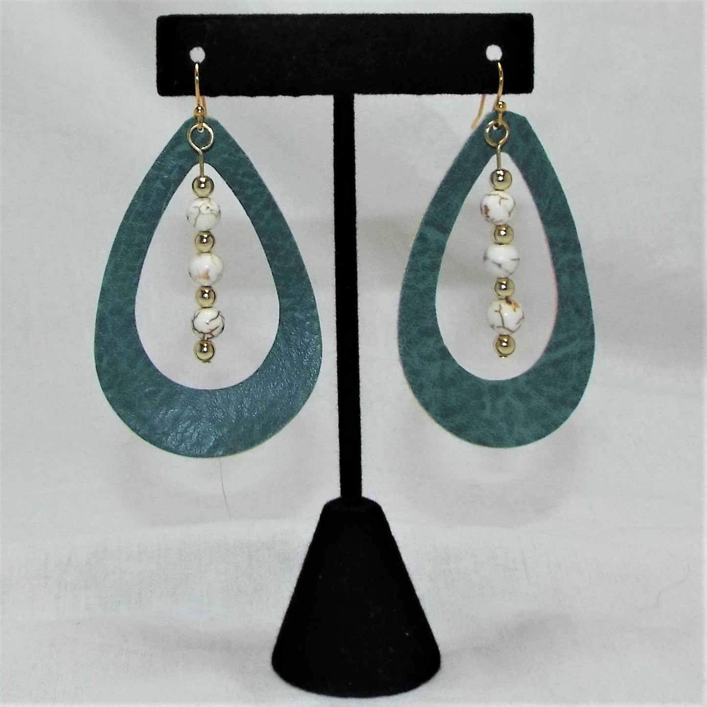Earrings, leather