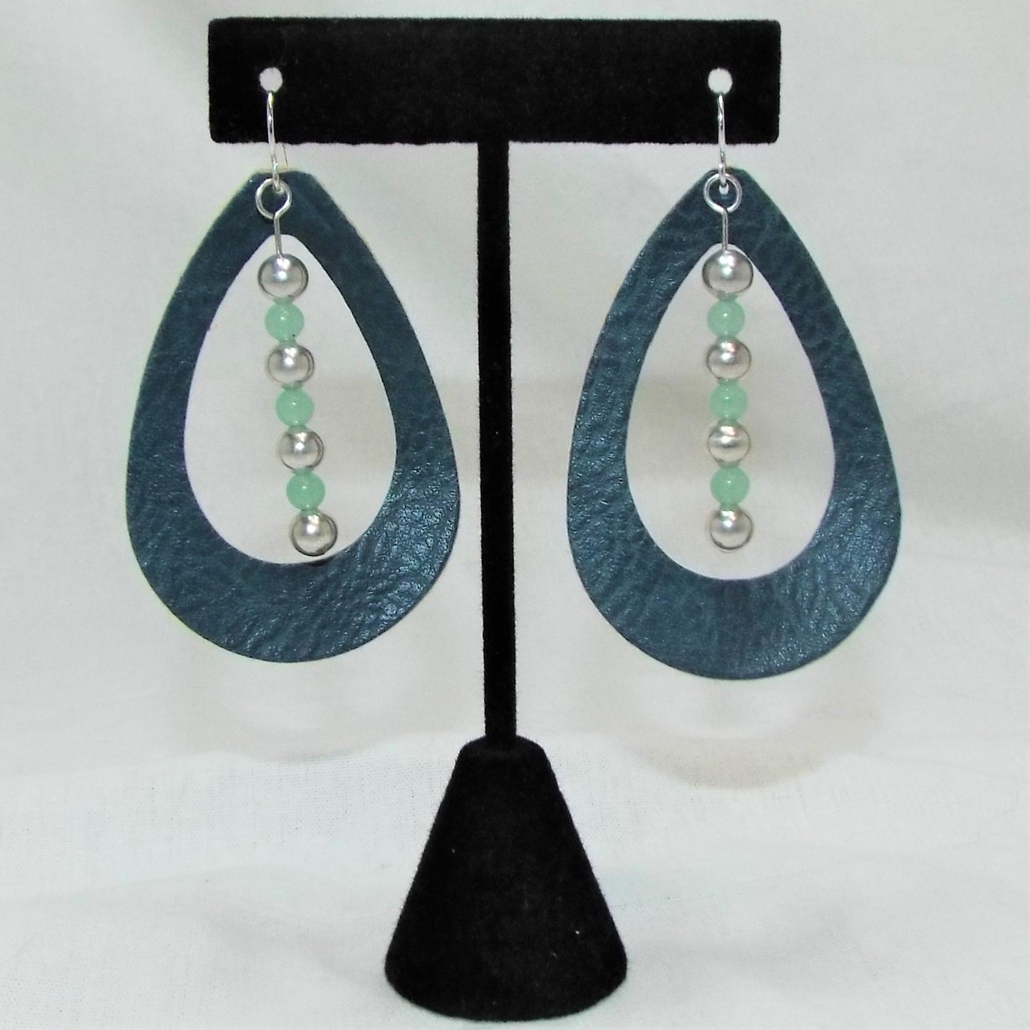 Earrings, leather