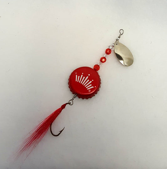 Lure has a red bottle cap with a crown,  red & clear beads, and red fly.